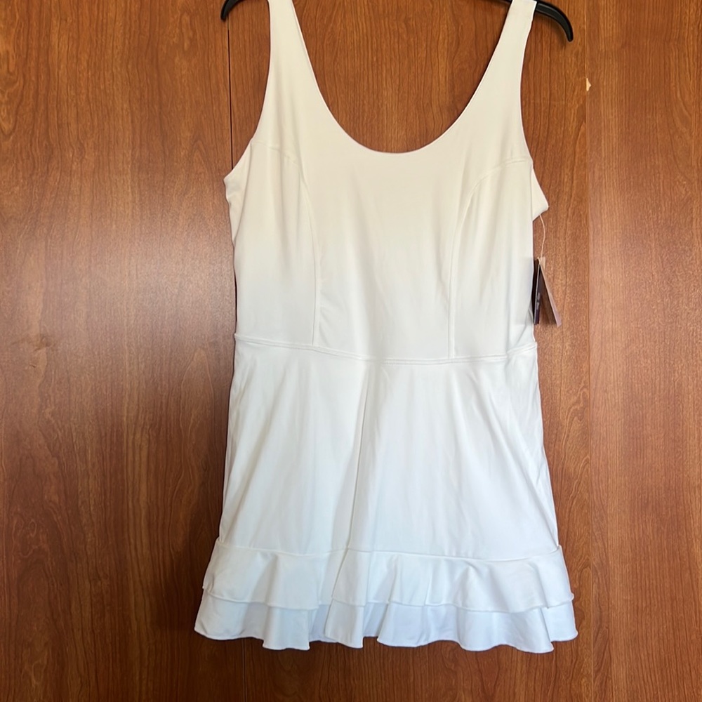 Joylab white sportswear with shorts and pocket inside.